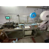 FULLY AUTOMATIC MASK MAKING MACHINE WITH AUTOMATIC LOOPING ATTACHMENT DUEL LOOP SEAL